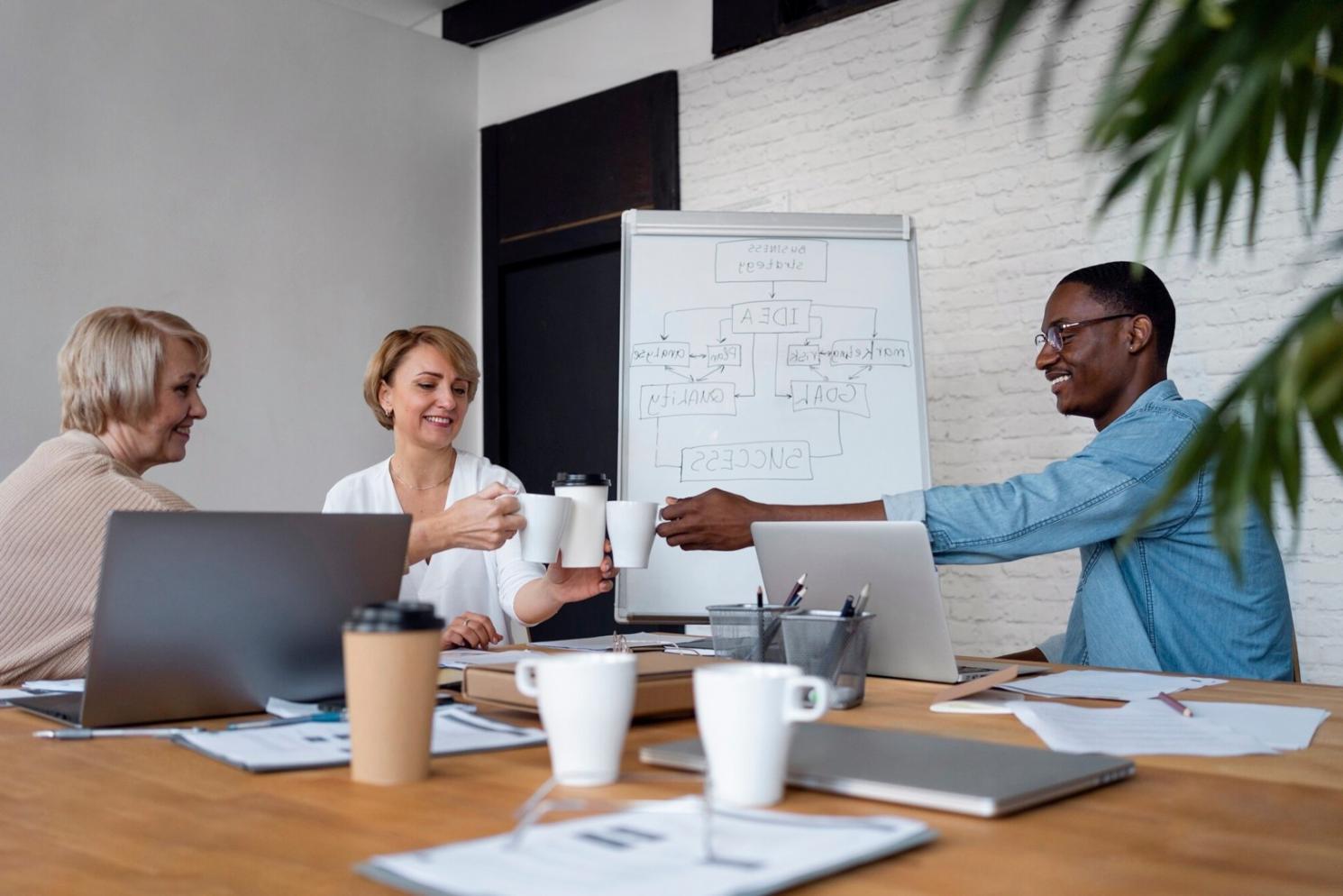 Business planning workspace with financial documents and coffee